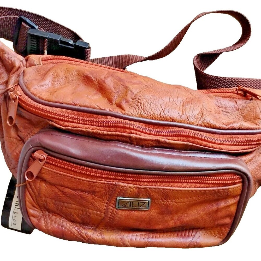 Womens Genuine Leather Fanny pack. Brand new. Adjustable Strap. Several Pockets
